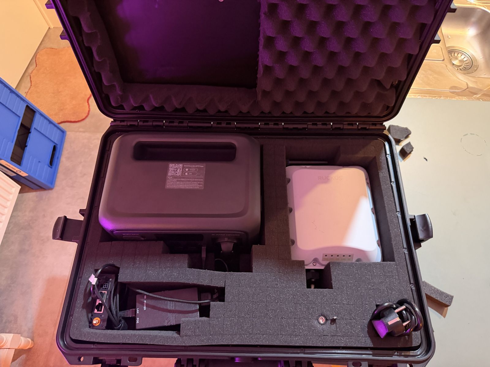 The case open with all parts in the foam